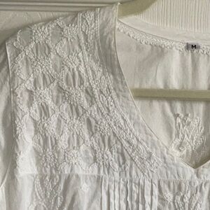 Women’s long cotton shirt/blouse.